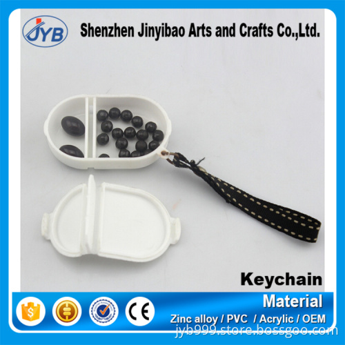 hot sale new design plastic custom oval pills drug case box keyring
